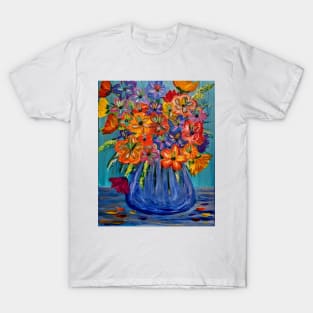 A lovely boutique of abstract bright and vibrant l flowers in a tall glass vase T-Shirt